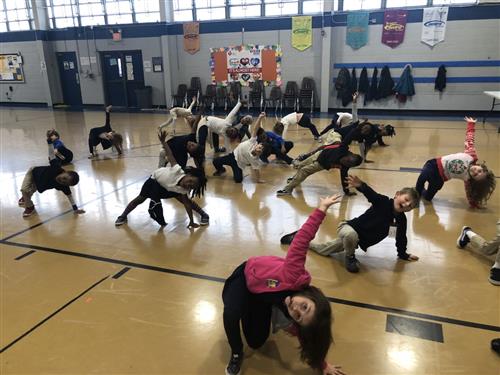 students stretching in PE 